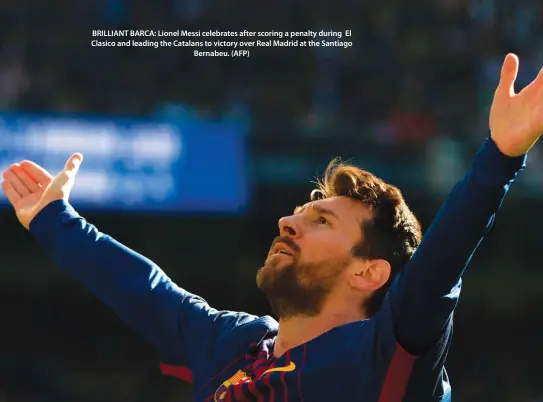  ??  ?? BRILLIANT BARCA: Lionel Messi celebrates after scoring a penalty during El Clasico and leading the Catalans to victory over Real Madrid at the Santiago Bernabeu. (AFP)