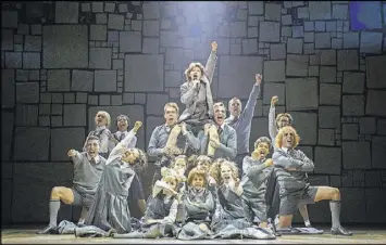  ?? CONTRIBUTE­D BY JOAN MARCUS ?? The cast of “Matilda” performs the song “Revolting Children.” A touring version of the hit musical based on Roald Dahl’s 1988 novel arrives at the Fox Theatre from April 1823, and the show’s creators and performers say they sought to capture the...