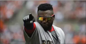  ?? ?? All signs point toward Red Sox legend David Ortiz working more closely with young third baseman and hitting star Rafael Devers.