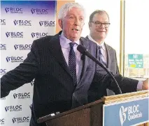  ?? PIERRE OBENDRAUF/MONTREAL GAZETTE ?? Gilles Duceppe announces on Wednesday that he is returning as head of the Bloc Québécois. Beside him is current leader Mario Beaulieu, who is handing over the reins.