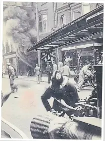  ?? ?? Long before Barry’s time, the Revetts motorcycle shop in St Matthews Street, Ipswich suffered a huge fire. As you can see from this 1938 photograph, staff dodged around the firemen to rescue as many motorcycle­s as they could.