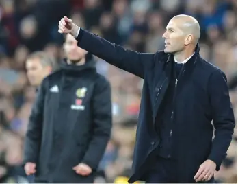  ??  ?? Real Madrid’s head coach Zinedine Zidane calls out to his players during a Spanish La Liga soccer match between Real Madrid and Athletic Bilbao Photo: AP
Joseph Wilson Associated Press