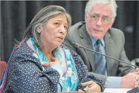  ?? RYAN REMIORZ THE CANADIAN PRESS ?? Mohawk elder Sedalia Fazio makes her opening statement as Jacques Viens, head of Quebec's Indigenous inquiry, looks on before the start of proceeding­s Monday.