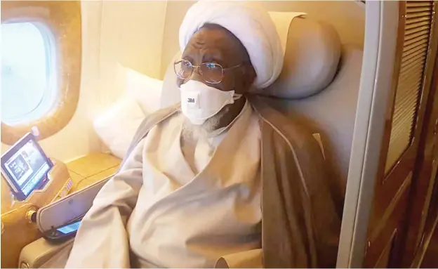  ?? Photo: BBC ?? Leader of the Islamic Movement in Nigeria, Sheikh Ibrahim Zakzaky on board Emirates Airlines’ flight to India at the Nnamdi Azikiwe Internatio­nal Airport in Abuja yesterday