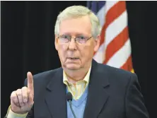  ?? Timothy D. Easley / Associated Press ?? Senate Majority Leader Mitch McConnell, R-Ky., predicts Americans will feel the effects of the tax plan by next fall.