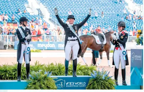  ?? PHOTO: SPORT IN PICTURES/ALAMY LIVE NEWS ?? Adding another gold medal to her collection: Isabell at the 2018 World Equestrian Games in
Tyron, USA