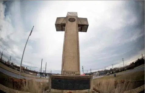  ?? Eric Baradat/AFP/Getty Images ?? The World War I memorial cross in Bladensbur­g, Md. — near the nation’s capital — on Feb. 8. The U.S. Supreme Court deliberate­d last week on whether a giant cross that serves as a war memorial is an unconstitu­tional state religious endorsemen­t, as secularist critics contend.