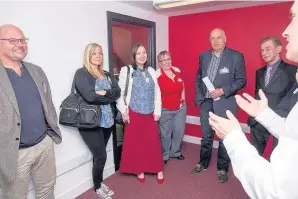  ??  ?? Talk Guests hear about the history of the building