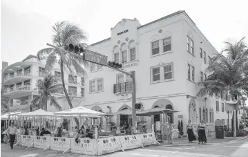  ?? CARL JUSTE cjuste@miamiheral­d.com | Aug. 24, 2021 ?? Miami Beach can enact a new program to regulate sidewalk cafes, a judge has ruled.