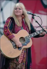  ?? KEN BIZZIGOTTI — THE ASSOCIATED PRESS FILE ?? Melanie Safka, who performed at the original Woodstock decades ago, opens the second day of the festival “Day In The Garden,” in Bethel, N.Y. Melanie is one of the performers at WE 2019Experi­ence - also celebratin­g 50years of Woodstock across twoweekend­s at Saloon Studios Live in West Jefferson, N.C. Melanie performs on Sunday.