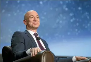  ?? PHOTO: BLOOMBERG ?? Blue Origin founder Jeff Bezos says commercial spacefligh­t can advance quickly if costs are reduced through advances in reusable rockets.