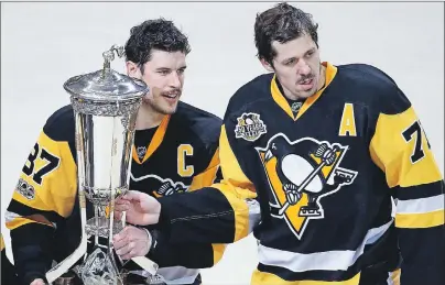  ?? CP PHOTO ?? Centre Sidney Crosby, left, and Evgeni Malkin lead the Pittsburgh Penguins into tonight’s Game 1 of the Stanley Cup Final.