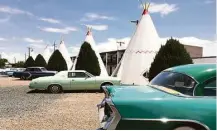  ?? Andrea Sachs / Washington Post ?? Guests sleep in 15 teepees at the Wigwam Motel, part of a chain built in the 1930s. Vintage cars add to the old-timey feel. Only three of the properties still survive, including this one in Holbrook, Ariz.