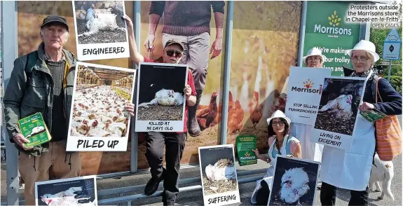  ?? OPEN CAGES ?? Protesters outside the Morrisons store in Chapel-en-le-Frith