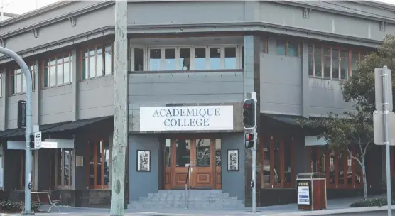  ??  ?? The Academique College sign is up over the former Courthouse Hotel in Southport.