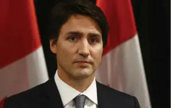  ?? RUBEN SPRICH/REUTERS ?? Canadian Prime Minister Justin Trudeau spoke solemnly in Davos, Switzerlan­d, about the shooting incident.