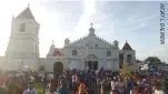  ??  ?? PEOPLE flock to the San Lorenzo De Martyr Parish Church, home of the Balangiga bells, for the turnover ceremony on Dec. 15.