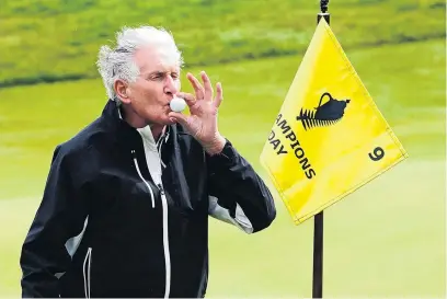  ?? PHOTO: MICHAEL THOMAS/WWW.PHOTOSPORT.CO.NZ ?? Sweet success . . . Golfing great Sir Bob Charles kisses a ball after nailing a holeinone at the parthree tournament at the Farm course, beside The Hills, yesterday.