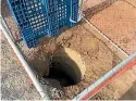  ??  ?? The hole a woman had to be rescued from in Commerce Lane, Mt Maunganui, yesterday morning.