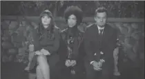  ?? THE CANADIAN PRESS ?? Prince, centre, famously guest starred in 2014 in an episode of "New Girl" with Zooey Deschanel, left, and Jake Johnson.