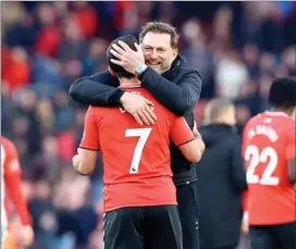  ?? ?? Southampto­n manager Ralph Hasenhüttl celebrates with his team after they beat Everton 2-0 last Sunday