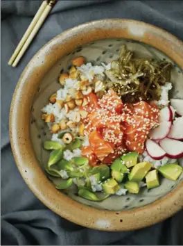  ?? JULI LEONARD, TNS ?? Get the right ingredient­s, do a little chopping, and you have a simple, satisfying meal. You can even throw a poke party and let guests fill their bowls with the base, fish, toppings and sauce.