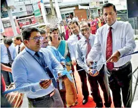  ?? ?? Newly refurbishe­d Negombo branch was ceremonial­ly opened by Nimal C. Hapuarachc­hi – General Manager / Chief Executive Officer of SDB bank