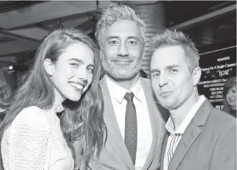  ?? — AFP photo ?? (Left to right) Margaret Qualley, Taika Waititi and Sam Rockwell attend Vanity Fair and FX’s annual Primetime Emmy Nomination­s Party on Saturday in Century City, California.