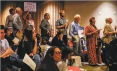  ?? Josie Norris / The Chronicle ?? Opponents of removing a mural at S.F.’s George Washington High School wait to speak during the school board meeting Tuesday.