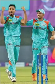  ?? ?? Lucknow pacer Avesh Khan (left) celebrates a Kolkata wicket in an IPL game on Saturday.