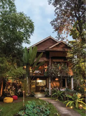  ??  ?? Above: The romantic Mie Café occupies a traditiona­l wooden house near the Siem Reap River.
Opposite: The restaurant’s chefowner, Pola Siv.