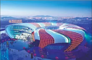  ??  ?? The $8.2 billion Oriental Movie Metropolis, built along Qingdao’s West Coast New Area, combines film and television production with a theme park.