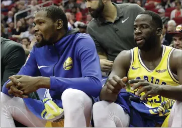  ?? PHOTOS: DAVID J. PHILLIP — THE ASSOCIATED PRESS ?? Draymond Green, right, indicated his incident with Kevin Durant, left, will not affect team chemistry going forward.