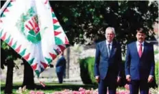  ??  ?? BUDAPEST: Austrian President Alexander van der Bellen (L) and his Hungarian counterpar­t Janos Ader (R) listen to their national anthems in front of the presidenti­al palace of Buda Castle yesterday prior to their official meeting. — AFP