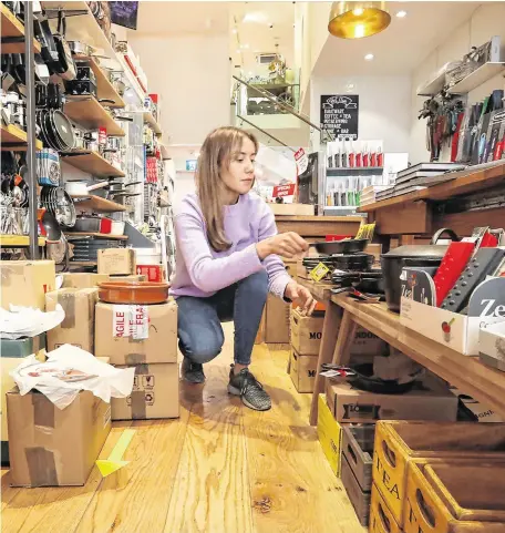  ?? PHOTO: SASKO LAZAROV/PHOTOCALL IRELAND ?? Back in business: Kate Masterson of the Kitchen Whisk shop on Wicklow Street gets ready for the reopening on Monday.