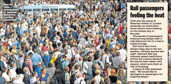  ??  ?? Hell on rails... Commuters at packed Waterloo, London, yesterday