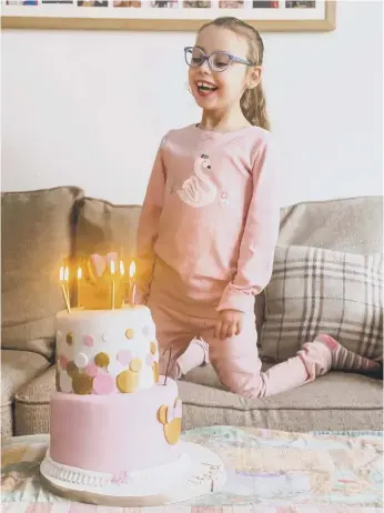  ??  ?? Chanel Murrish with her Minnie Mouse-themed birthday cake.