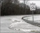  ?? ASSOCIATED PRESS ?? Strong currents from the swollen Pearl River flood over the Old Brandon Road Bridge in Jackson, Miss. on Sunday.