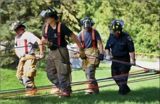  ?? BARRY GRAY, THE HAMILTON SPECTATOR ?? Four people were rescued from Greensvill­e’s Webster Falls last weekend. The conservati­on authority’s Gord Costie says it won’t fence off the entire escarpment. “At some point, people need to be acountable for their own safety.”