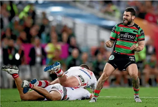  ?? GETTY IMAGES ?? Adam Reynolds celebrates one of his three field goals during South Syndey’s dramatic 13-12 win over St George Illawarra in an NRL semifinal on Saturday.