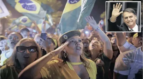  ?? LEO CORREA ?? SUPPORTERS of Jair Bolsonaro (inset picture), Brazil’s president-elect, celebratin­g after the presidenti­al run-off vote outside his residence in Rio de Janeiro soon afterwards. | AP/ African News Agency