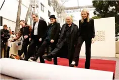  ?? — AFP photos ?? (From left) Barry Adelman, Ricky Kirshner, Glenn Weiss, Jo Koy and Helen Hoehne, President, Golden Globes, attend the 81st Annual Golden Globe Awards Press Preview and Red Carpet Rollout at The Beverly Hilton on Jan 4, 2024 in Beverly Hills, California.