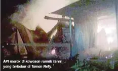  ??  ?? API marak di kawasan rumah teres yang terbakar di Taman Nelly.