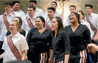  ??  ?? Wellington East Girls College head prefect Lemau Sio Lolesio, right, sings while on tour in Asia with the New Zealand Secondary Students Choir.