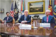  ?? Bloomberg ?? US President Donald Trump with Senate Majority Leader Mitch McConnell (right) and House Speaker Paul Ryan during a meeting with members of Congress on tax reform.