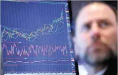  ?? — Reuters ?? A trader operates on the New York Stock Exchange (NYSE) trading floor in New York City.