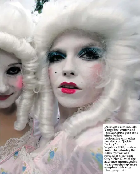  ?? Photograph: AP ?? Delirium Tremens, left, Vangeline, center, and Jessica Rabbit pose for a photo before performing with other members of “Jackie Factory” during Wigstock 2005, in New York. On Saturday the 1980s festival was revived at New York City’s Pier 17, with the audience encouraged to wear over-the-top attire complete with wigs