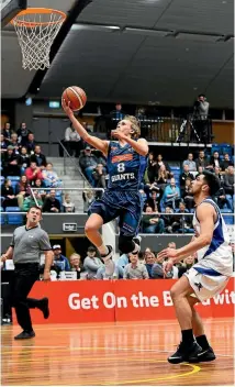  ?? PHOTO: CHRIS SYMES/PHOTOSPORT ?? Giants guard Kyle Adnam drives to the basket during last night’s loss to the Wellington Saints.