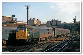  ?? COLOUR-RAIL, PAUL BIGLAND. ?? The changing face of King’s Cross station… from the early 1970s with BR 31115 rolling from Gasworks Tunnel with a rake of suburban Mk 1 coaches (above) to today’s equivalent with Great Northern 387104 (left). BR remodelled the station’s throat in the mid-1970s and Network Rail now proposes another remodellin­g but has met resistance from train operators concerned about the negative impact it could have on their performanc­e.