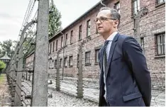  ?? Foto: Michael Kappeler, dpa ?? Bundesauße­nminister Heiko Maas in der Gedenkstät­te Auschwitz: „Die Hölle auf Er den – sie war eine deutsche Schöpfung.“
